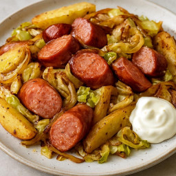 Entree: Poland – Roasted Kielbasa and Potato Wedges with Caramelized Onions recipe