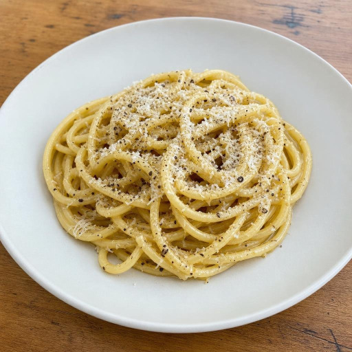 Entree: Italy – Rome – Bucatini cacio e pepe (Bucatini with Pecorino Romano and black pepper) recipe